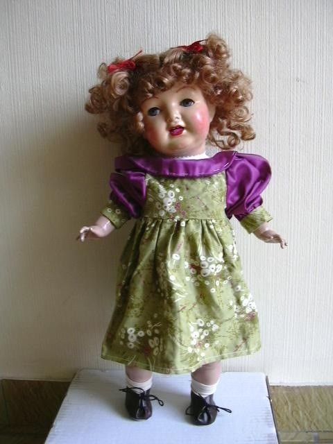 POUPEE DE  PORCELAINE